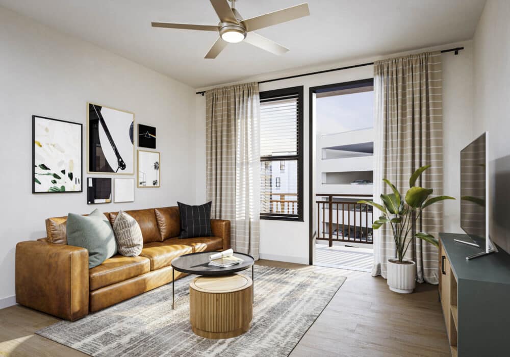 bright living room and balcony styled with modern furniture